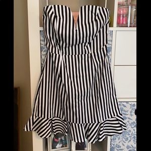 Strapless black and white striped mini dress
